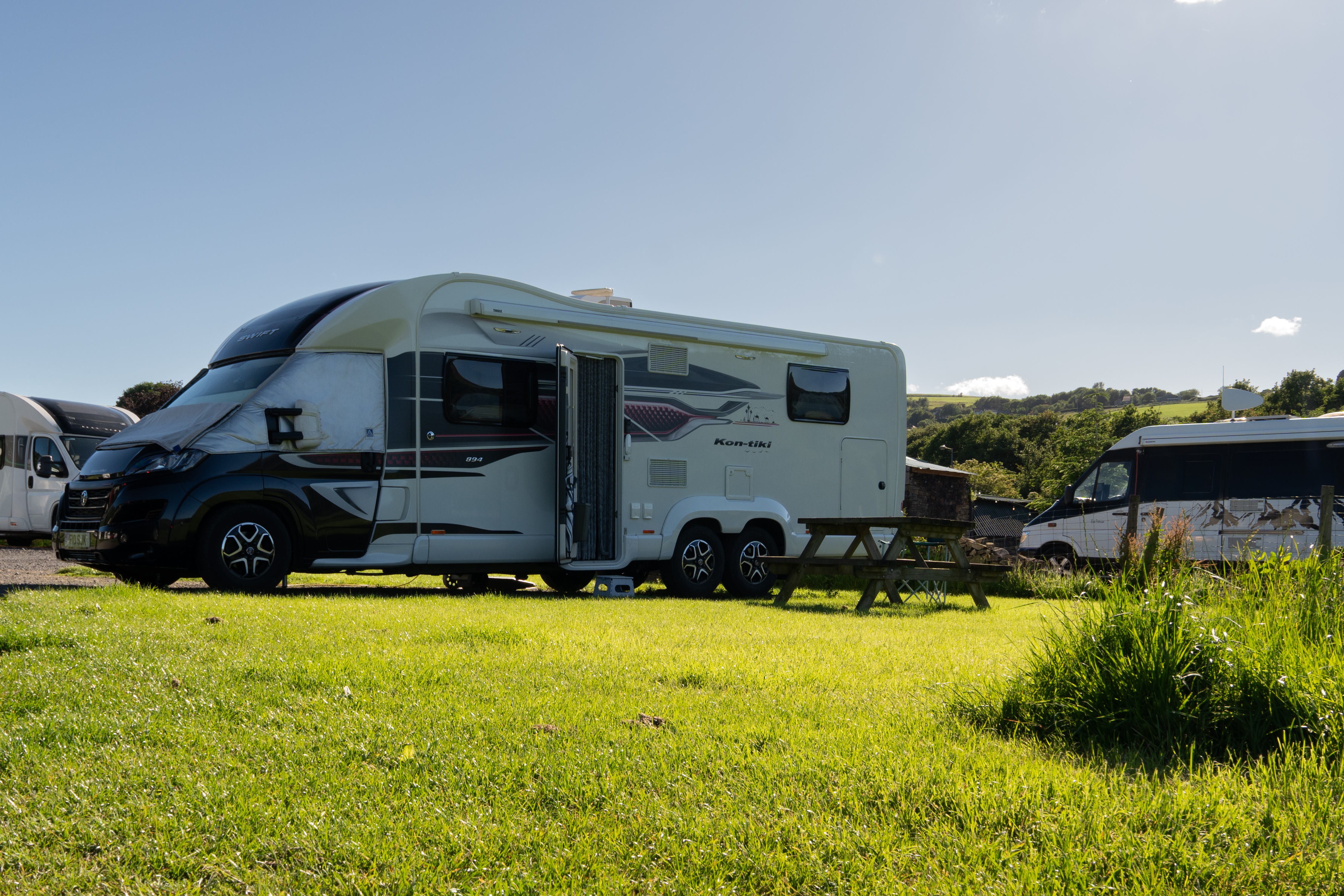 Motorhomes pitched on site at Well-i-Hole Farm